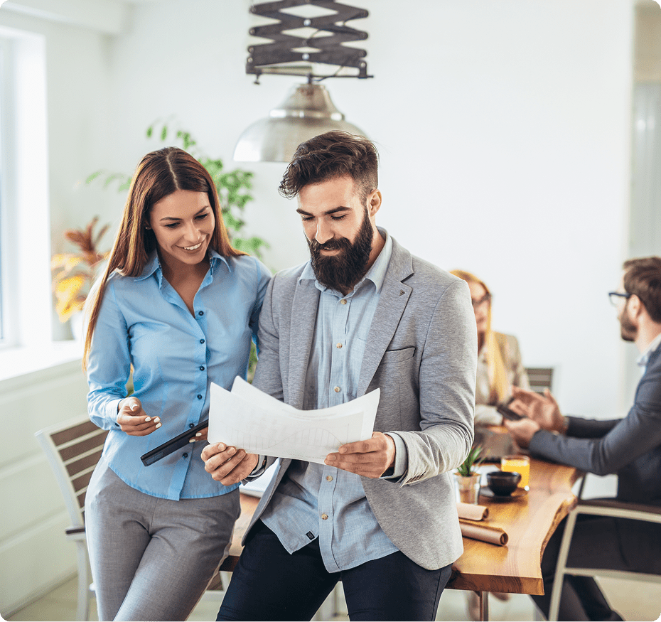 GettyImages-1044643144 Man and woman reviewing documents together.
